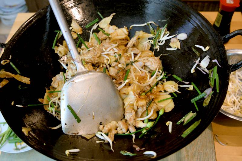 stir fry the beef hor fun over high heat