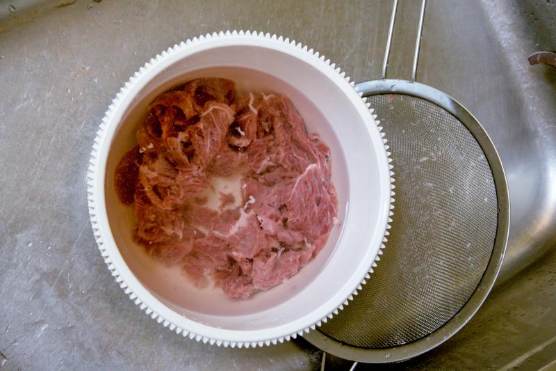 rinse the beef thoroughly to remove the baking soda