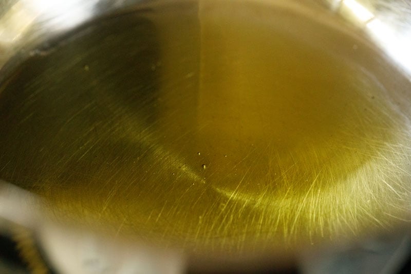 Oil in the bottom of a skillet.