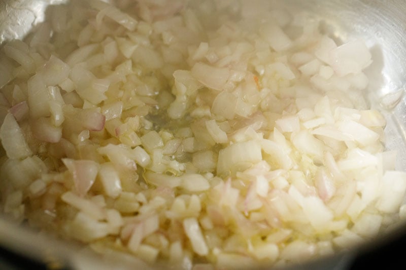 Onions and garlic after cooking - they are pale and translucent at the edges.