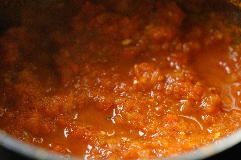 Completed homemade marinara in skillet - has a slightly thick, crushed tomato looking consistency.
