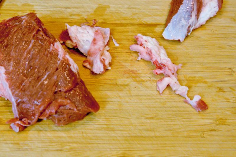 cut away the tough connective tissue (the silver skin)