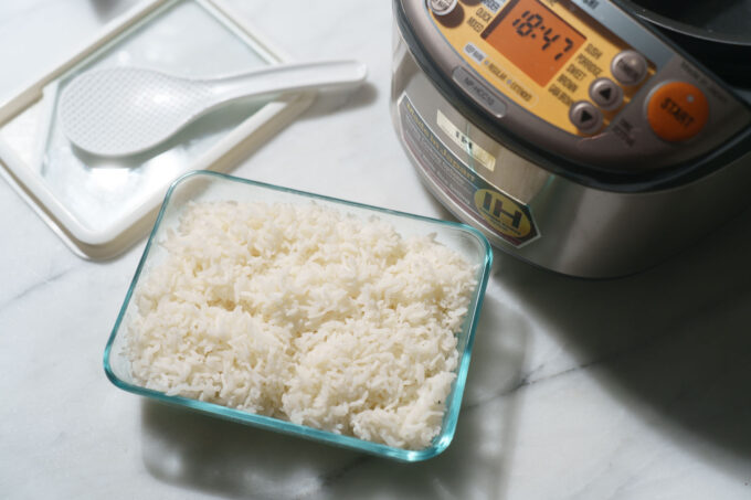 cooked jasmine rice in glass container