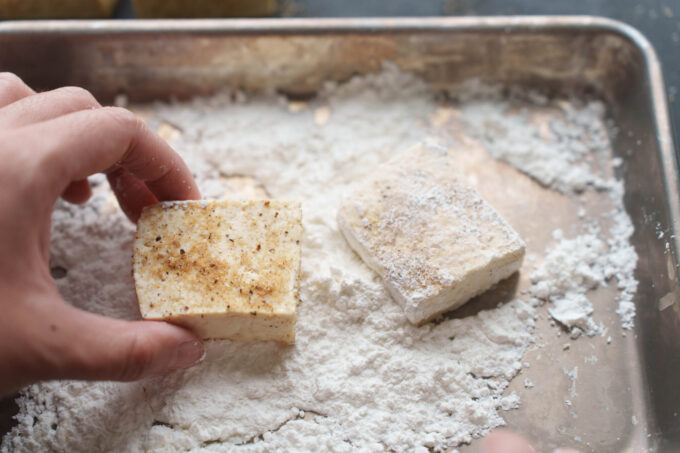 coating tofu slices in cornstarch