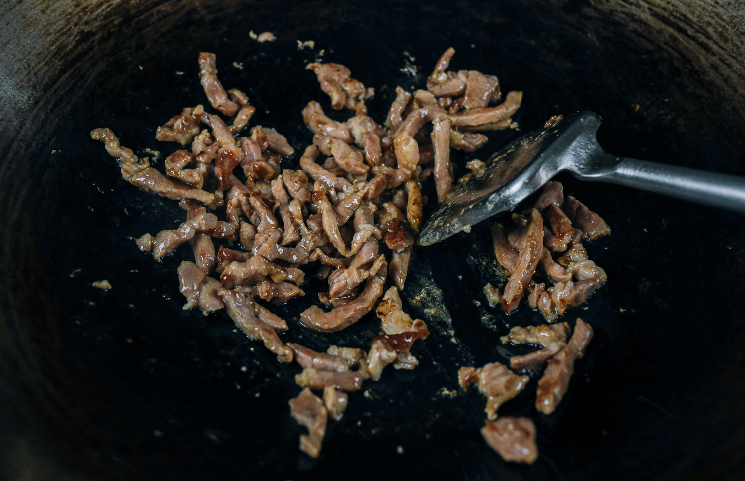 Seared pork in wok