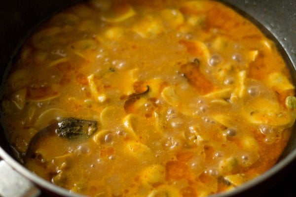Simmering mushroom masala curry in the pan.