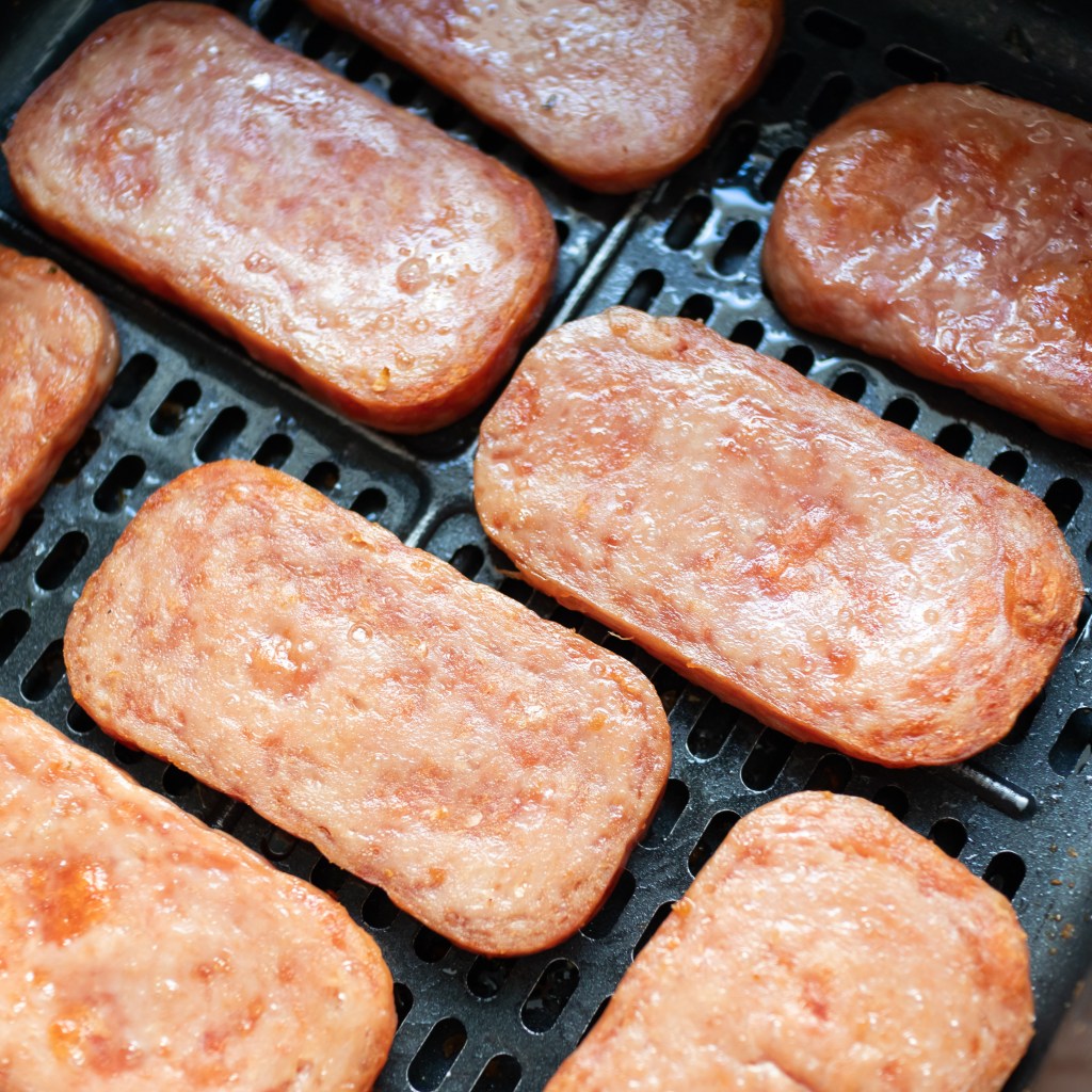 Air frying Spam slices for Hawaiian musubi