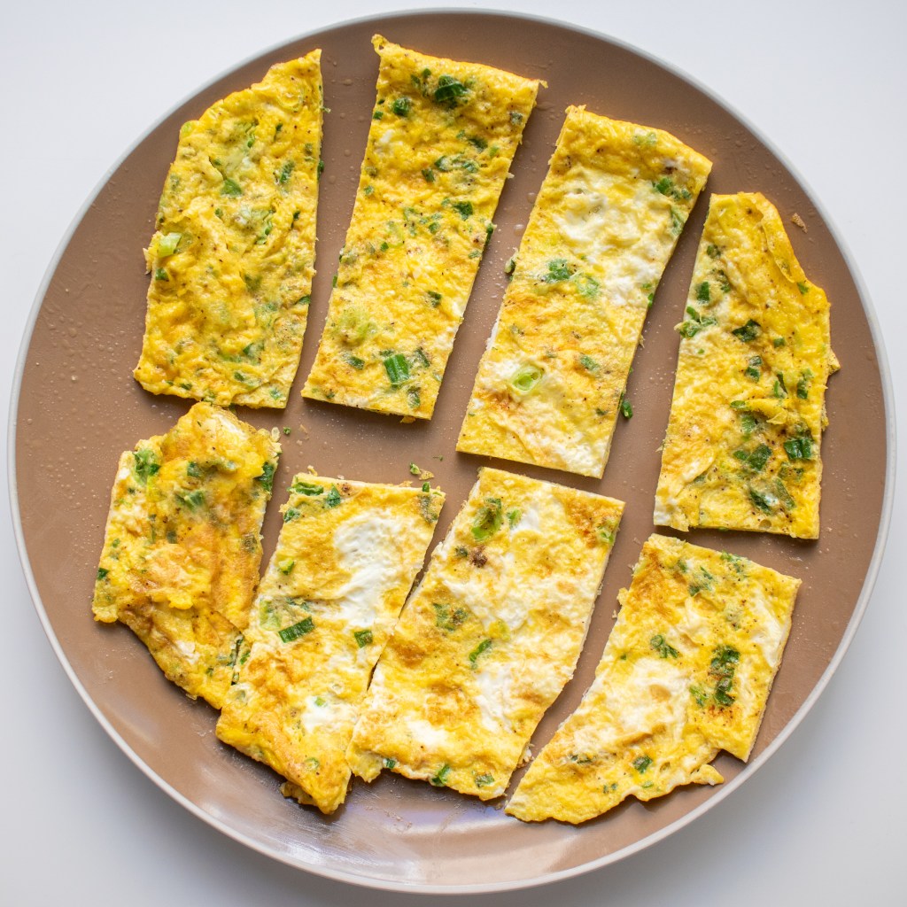 Making eggs for spam and egg musubi