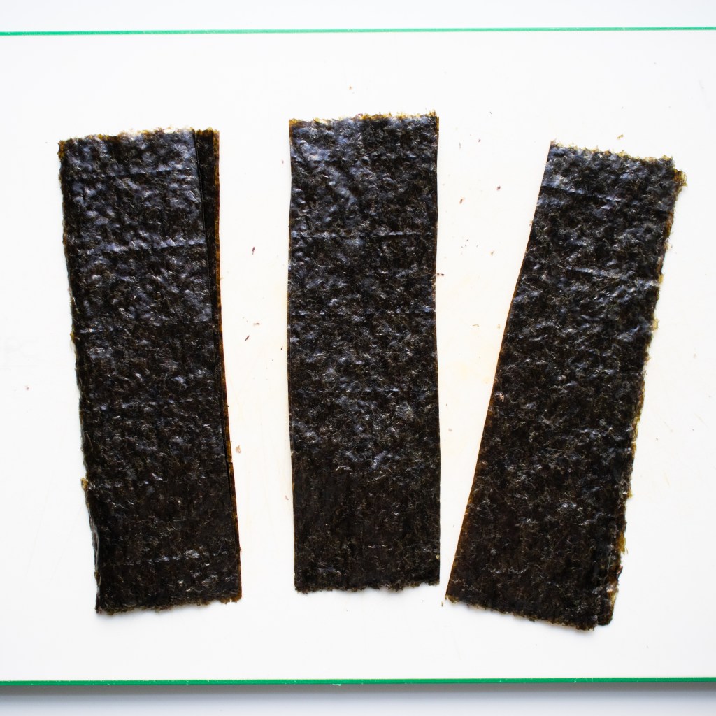 Nori sheets for spam and egg musubi - cut into thirds