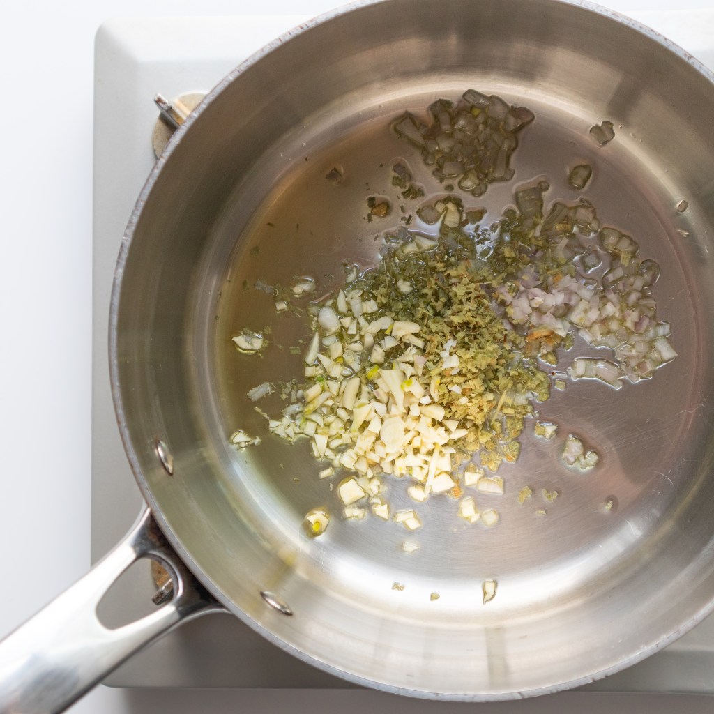 Toasting aromatics for Vietnamese braised turmeric chicken (Gà Kho Nghệ)