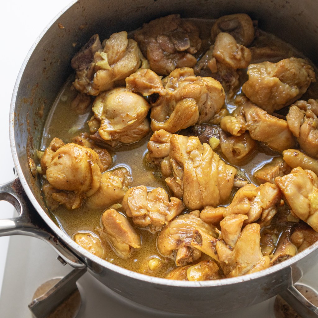 Vietnamese braised turmeric chicken (Gà Kho Nghệ) in a pot