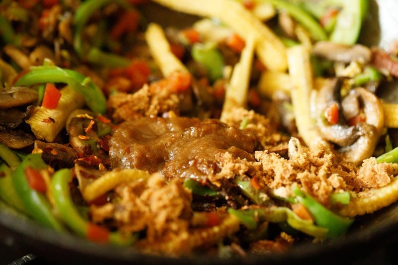 Seasonings and sauces added to the veggie-mushroom mixture.