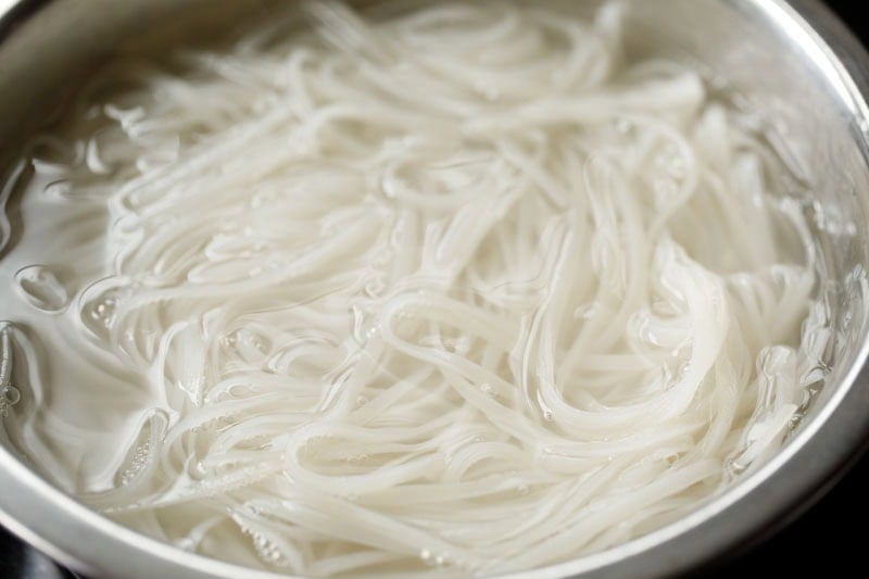 Cooking rice noodles.