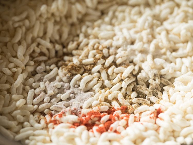 Spice powders and salt added to roasted puffed rice.
