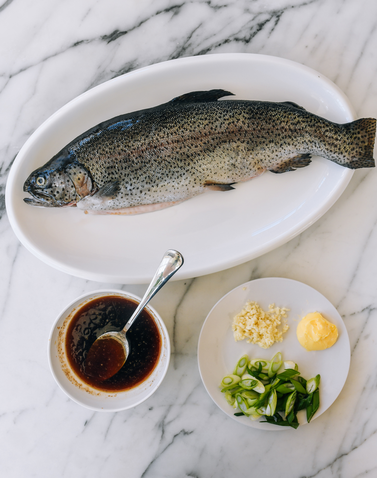 Ingredients for whole trout with soy garlic butter