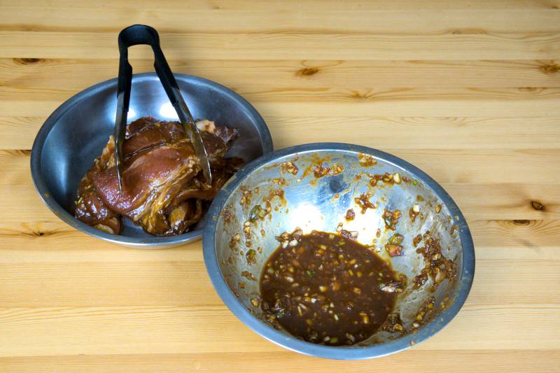 Remove the ginger, scallion, and garlic from the pork